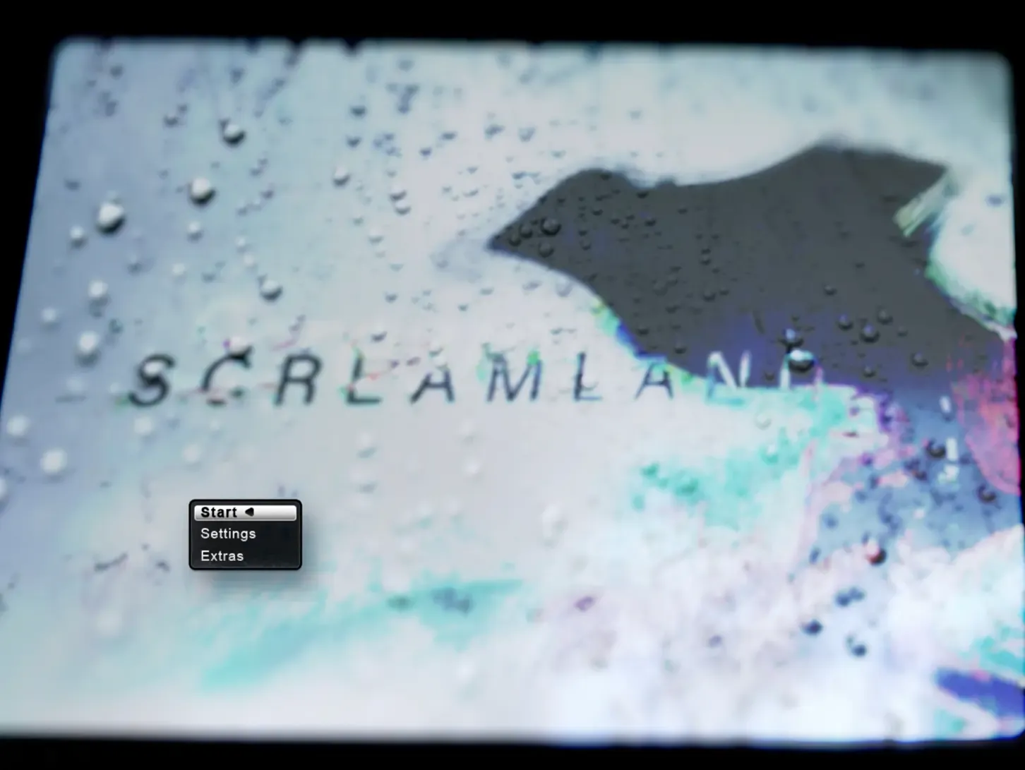 A grungy title screen with the text: ‘screamland’.